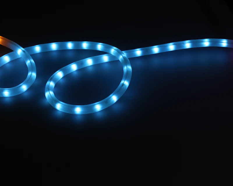 LED light strip glowing in a dark room